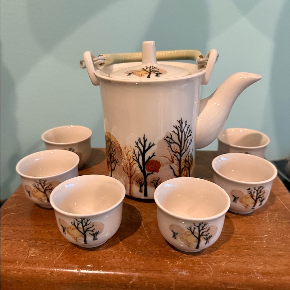 Vintage Stoneware Sake or Tea set includes pot and six cups.